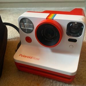 Polaroid Now + film - mint condition, minor cosmetic mark on top from sharpie